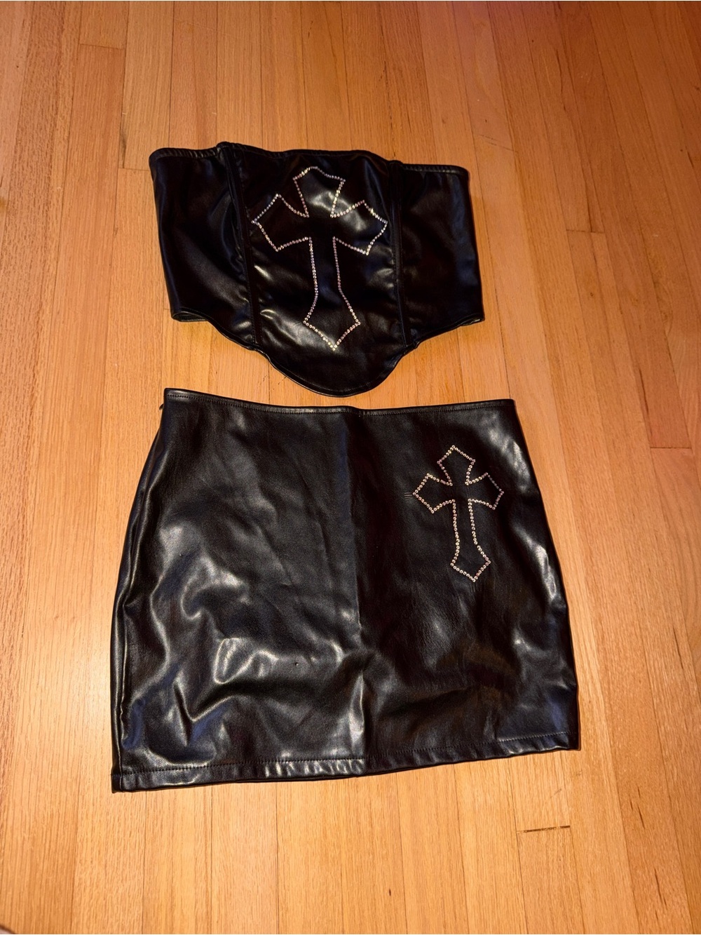 Black Faux Leather Mini Skirt with Cross Accent